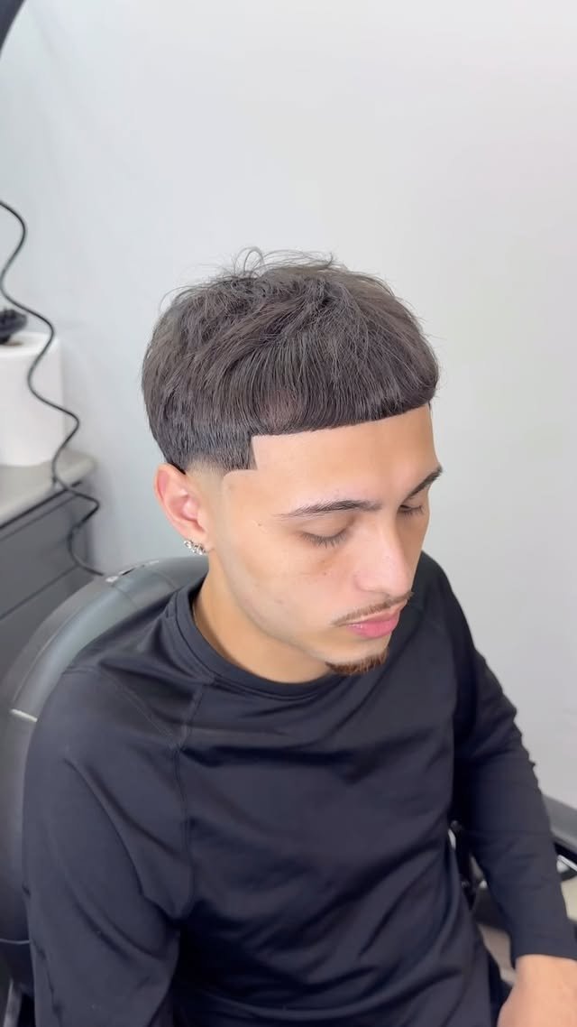 Client with a fresh mid taper and crisp lineup